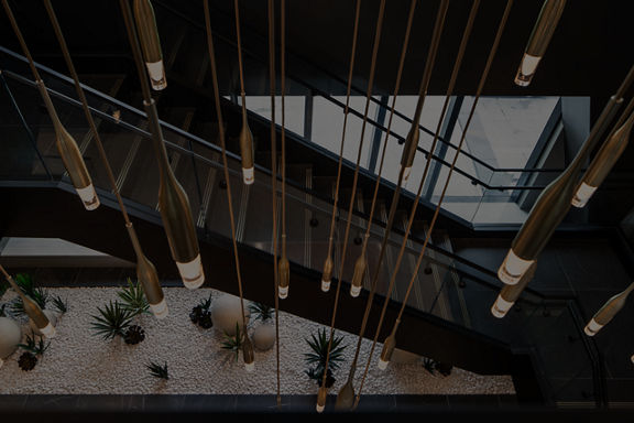 Interior view of a chandelier and staircase at Life Time
